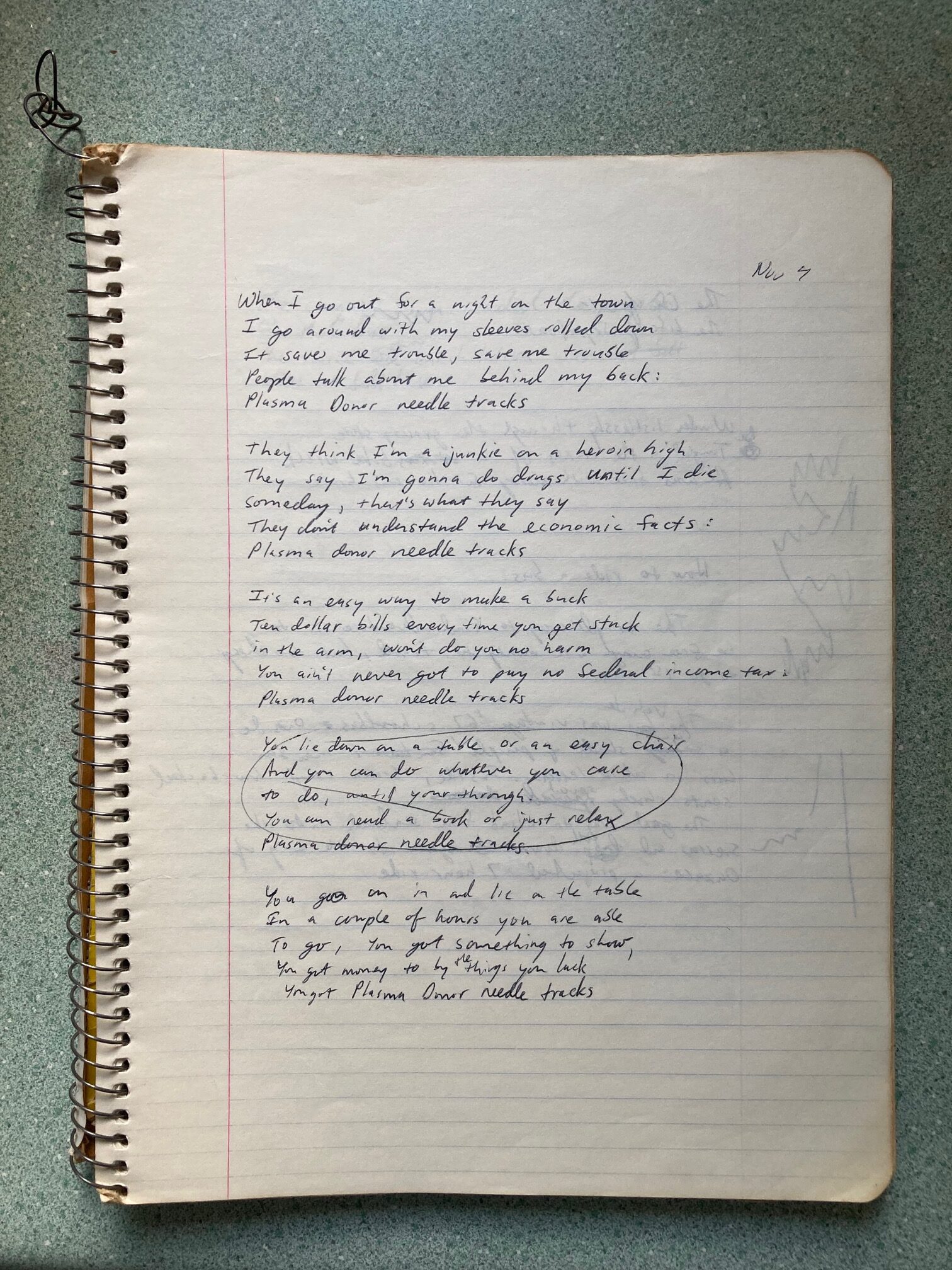 Spiral notebook with the familiar barely legible writing. 